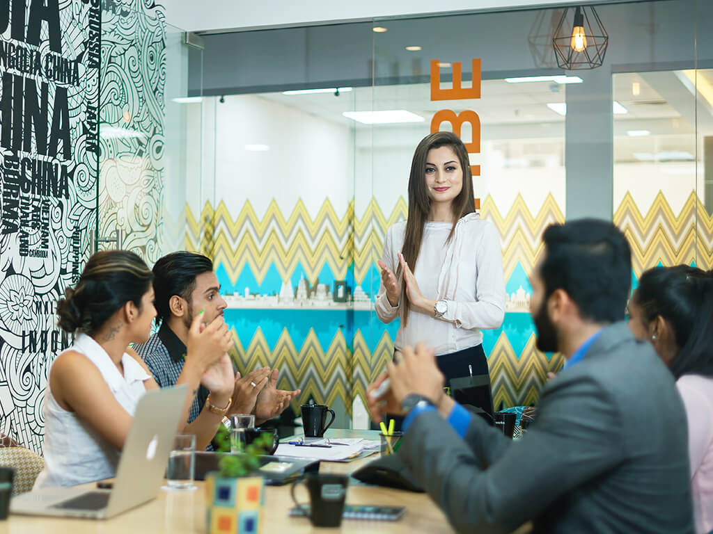 Legend Capital Group team discussing financial strategies